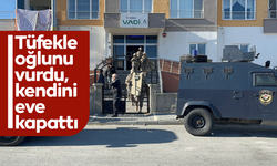 Tüfekle oğlunu vurdu, kendini eve kapattı