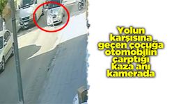 Yolun karşısına geçen çocuğa otomobilin çarptığı kaza anı kamerada