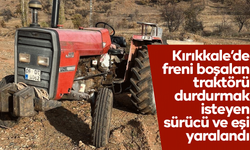 Freni boşalan traktörü durdurmak isterken yaralandılar