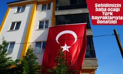 Şehidimizin baba ocağı Türk bayraklarıyla donatıldı