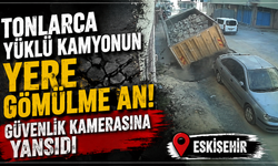Tonlarca yüklü kamyonun yere gömülme anı güvenlik kamerasına yansıdı
