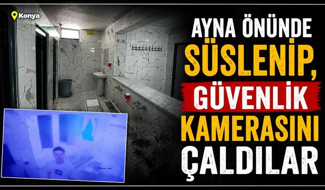 Ayna önünde süslenip, güvenlik kamerasını çaldılar